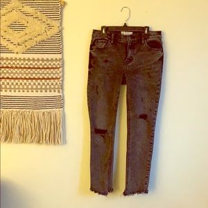 Free people distress denim in dark washed grey